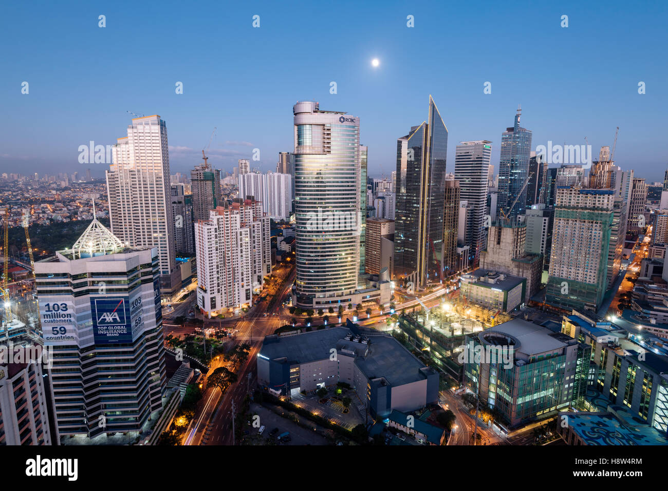 Makati Skyline at night. Makati is a city in the Philippines` Metro Manila region and the country`s financial hub. Stock Photo